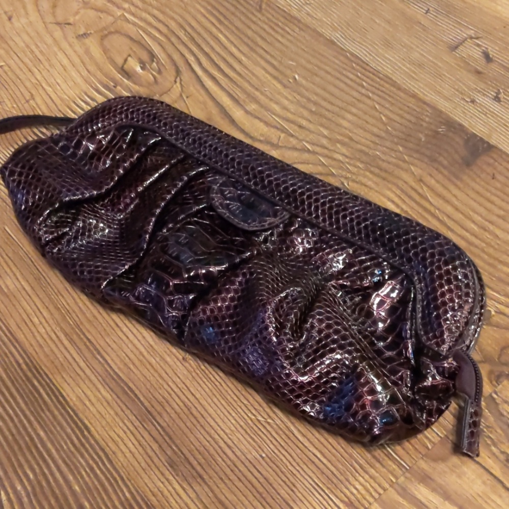 NWOT Purple faux leather skin hand bag clutch